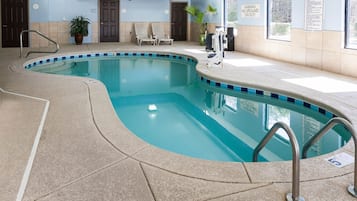 Indoor pool, open 9:00 AM to 10 PM, pool loungers