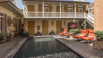 Outdoor pool, open 7:00 AM to 11:00 PM, sun loungers