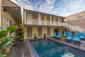 Outdoor pool, open 7:00 AM to 11:00 PM, sun loungers