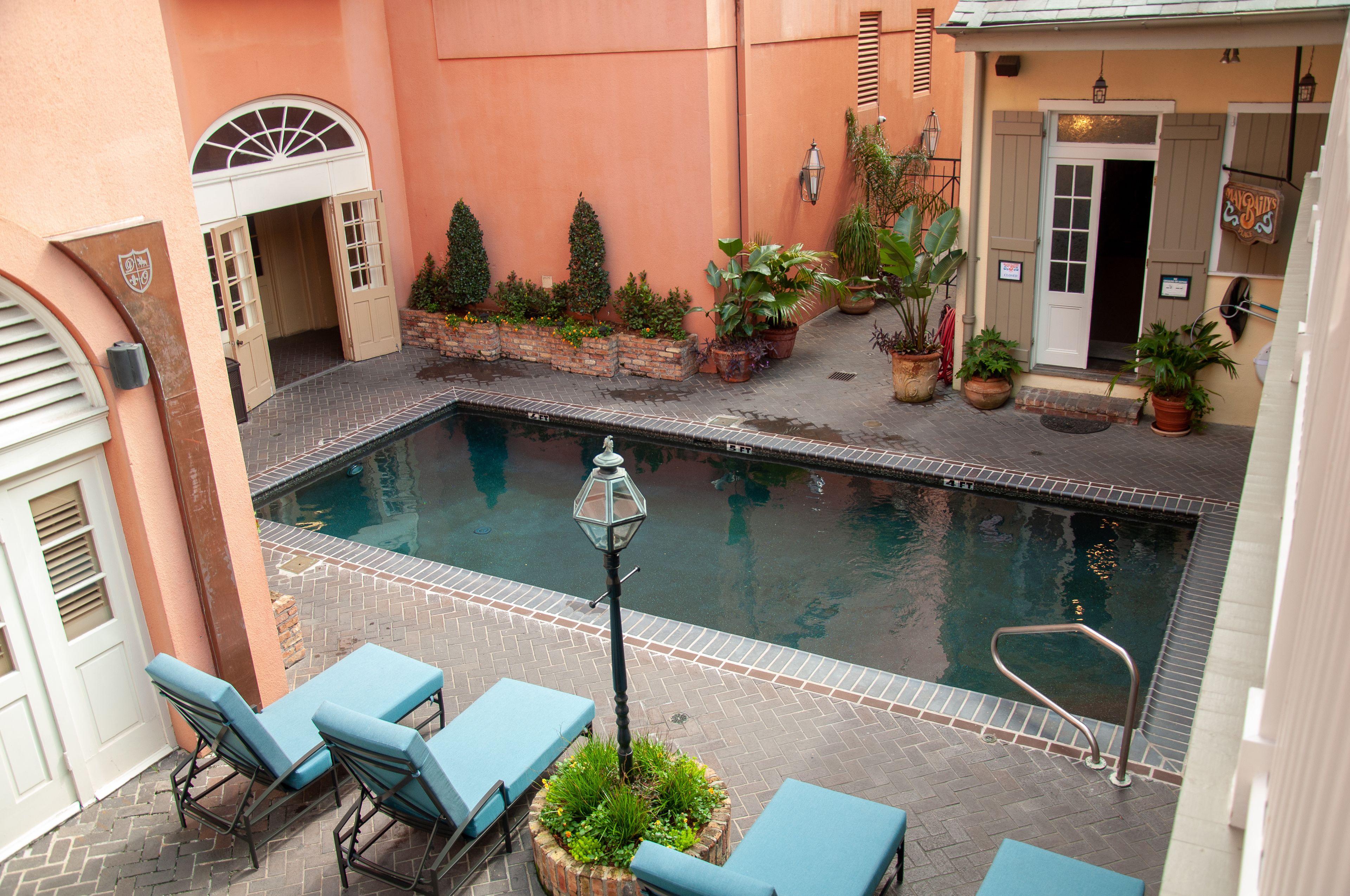 outdoor pool, open 7:00 am to 11:00 pm, pool loungers