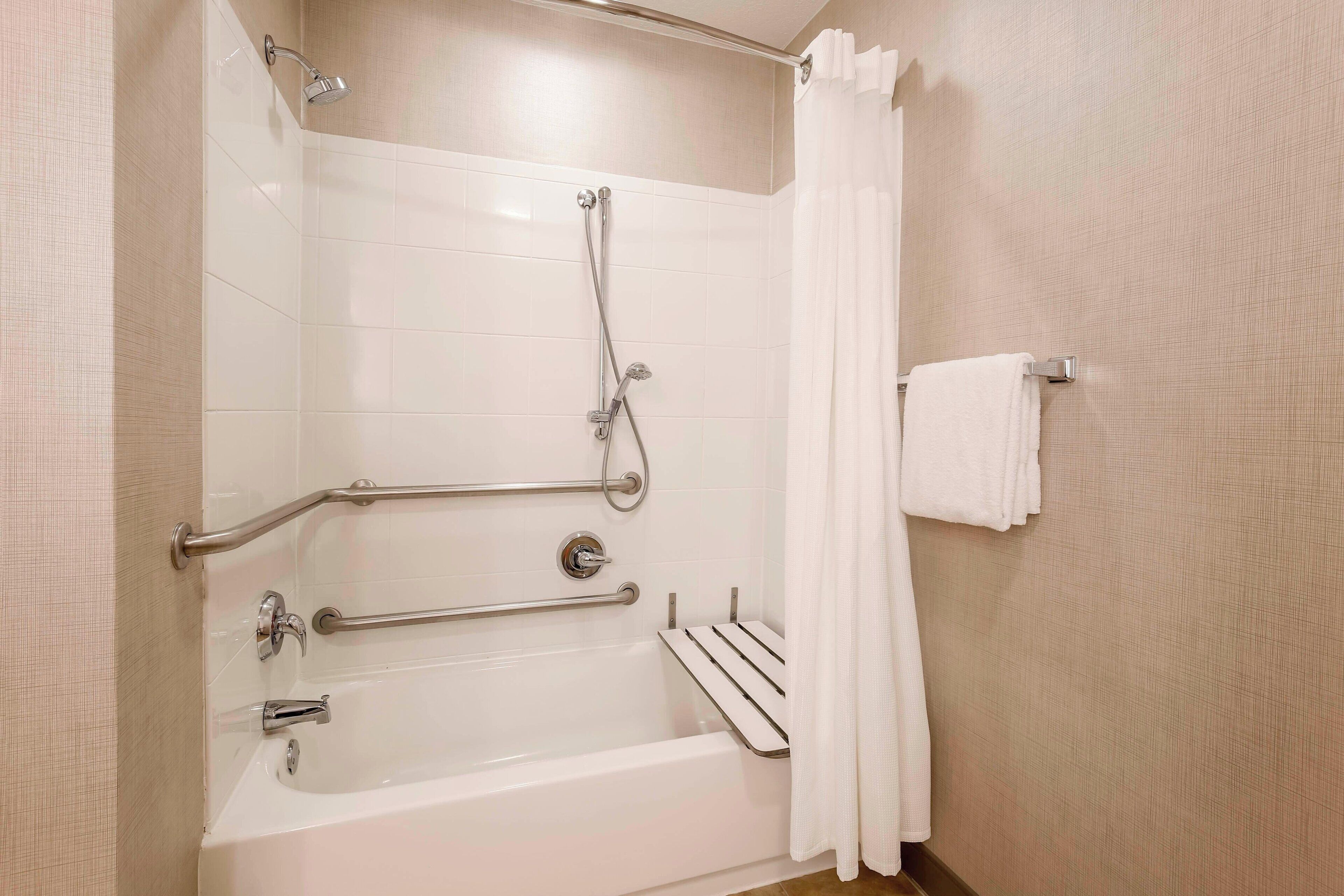 combined shower/bathtub, free toiletries, hair dryer, towels