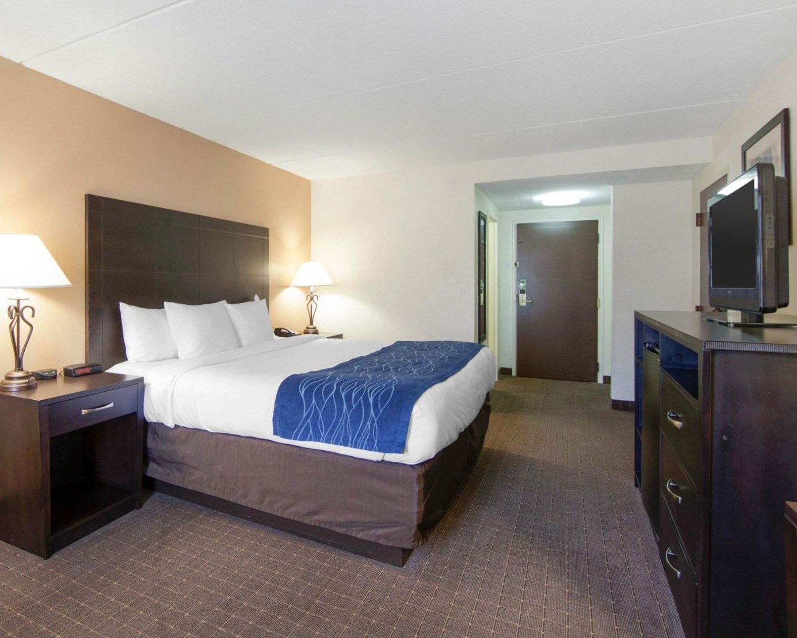 Down comforters, desk, blackout drapes, iron/ironing board