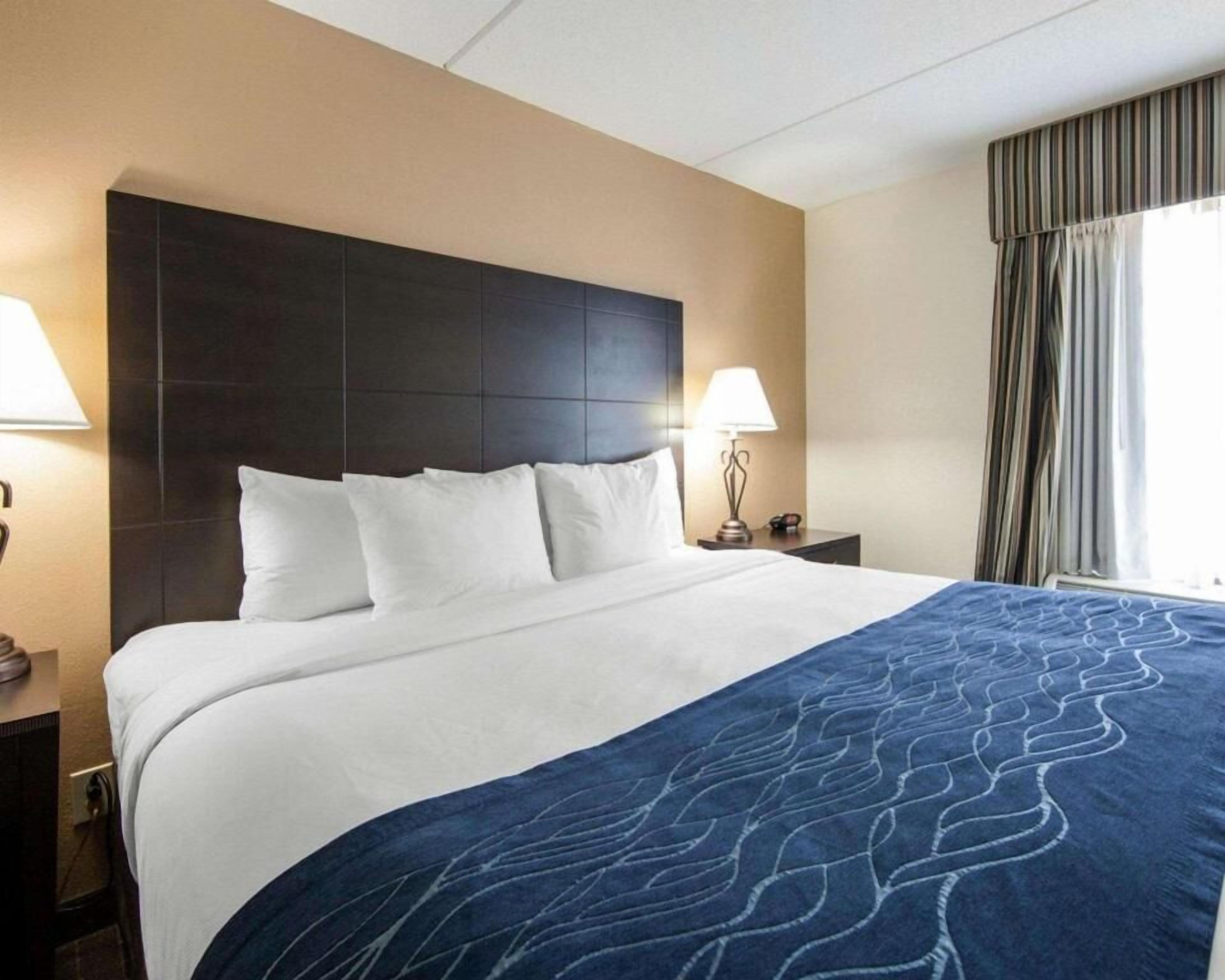 Down comforters, desk, blackout drapes, iron/ironing board