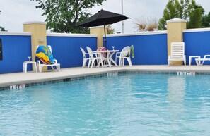 Seasonal outdoor pool, open 9 AM to 10 PM, pool umbrellas, sun loungers