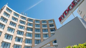 A multi-story hotel building with a sign reading "RYDGES". - Rydges Camperdown (Camperdown)