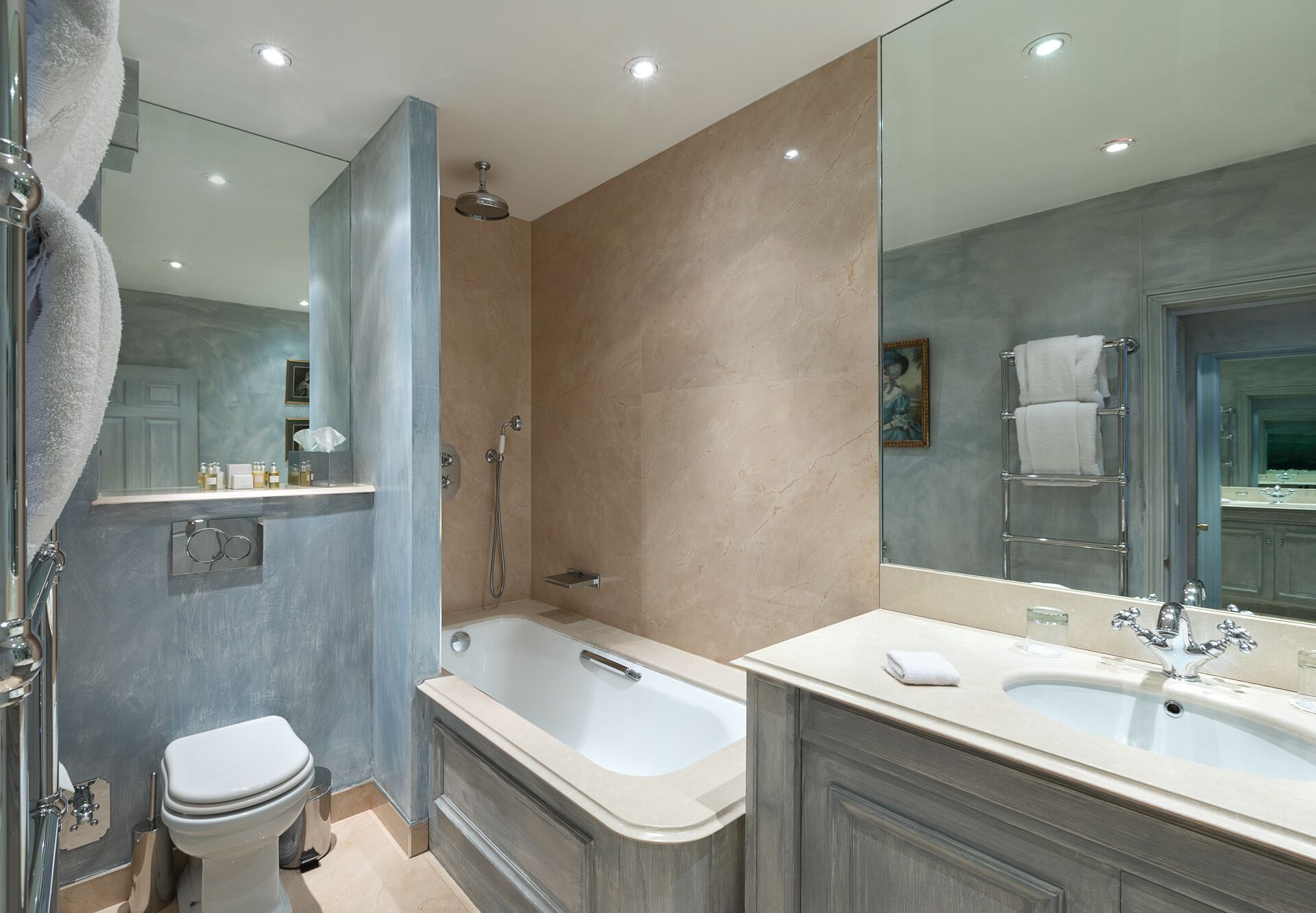 junior suite | bathroom | designer toiletries, hair dryer, bathrobes, slippers