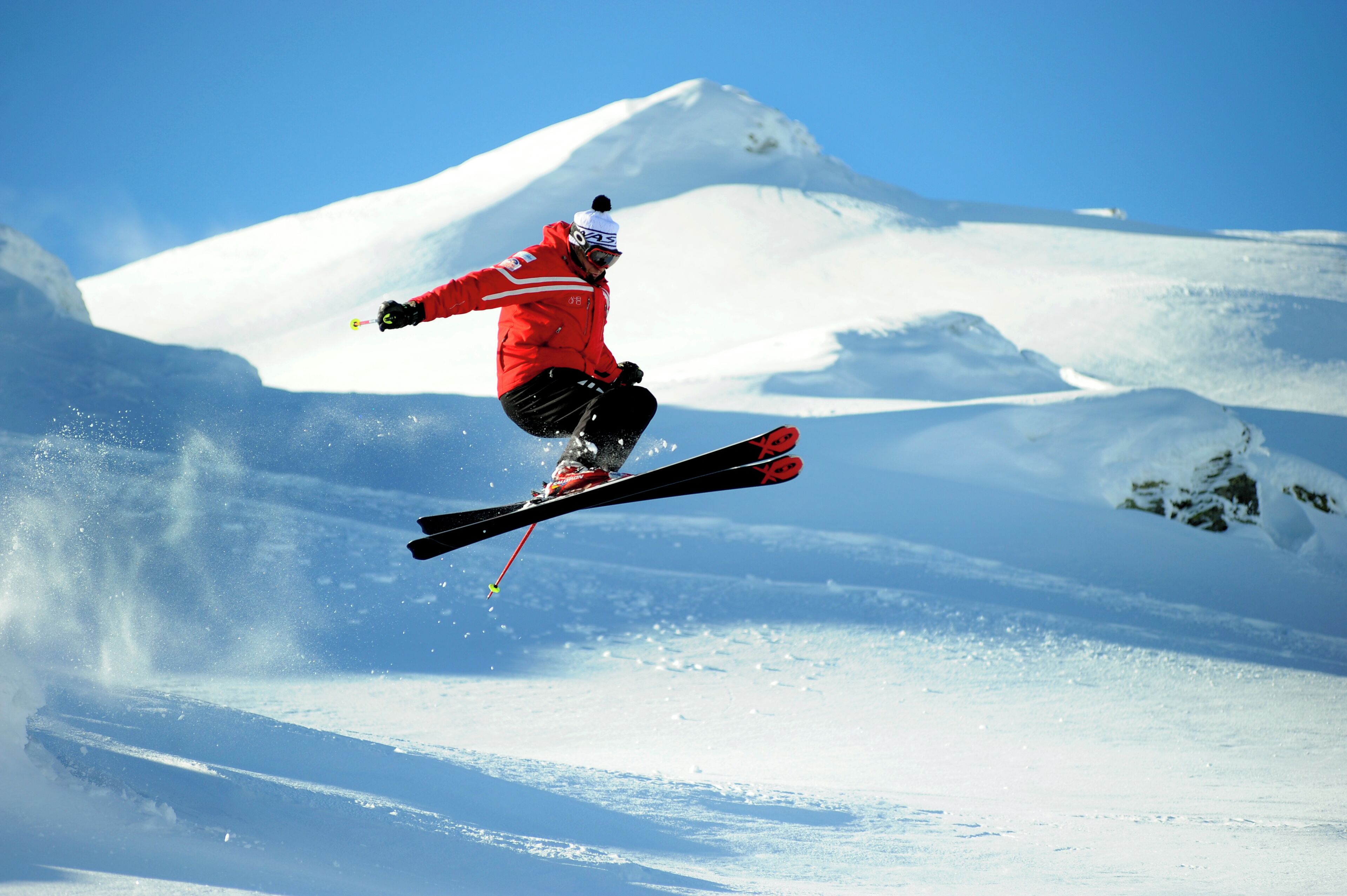 A person skiing on a snowy slope.