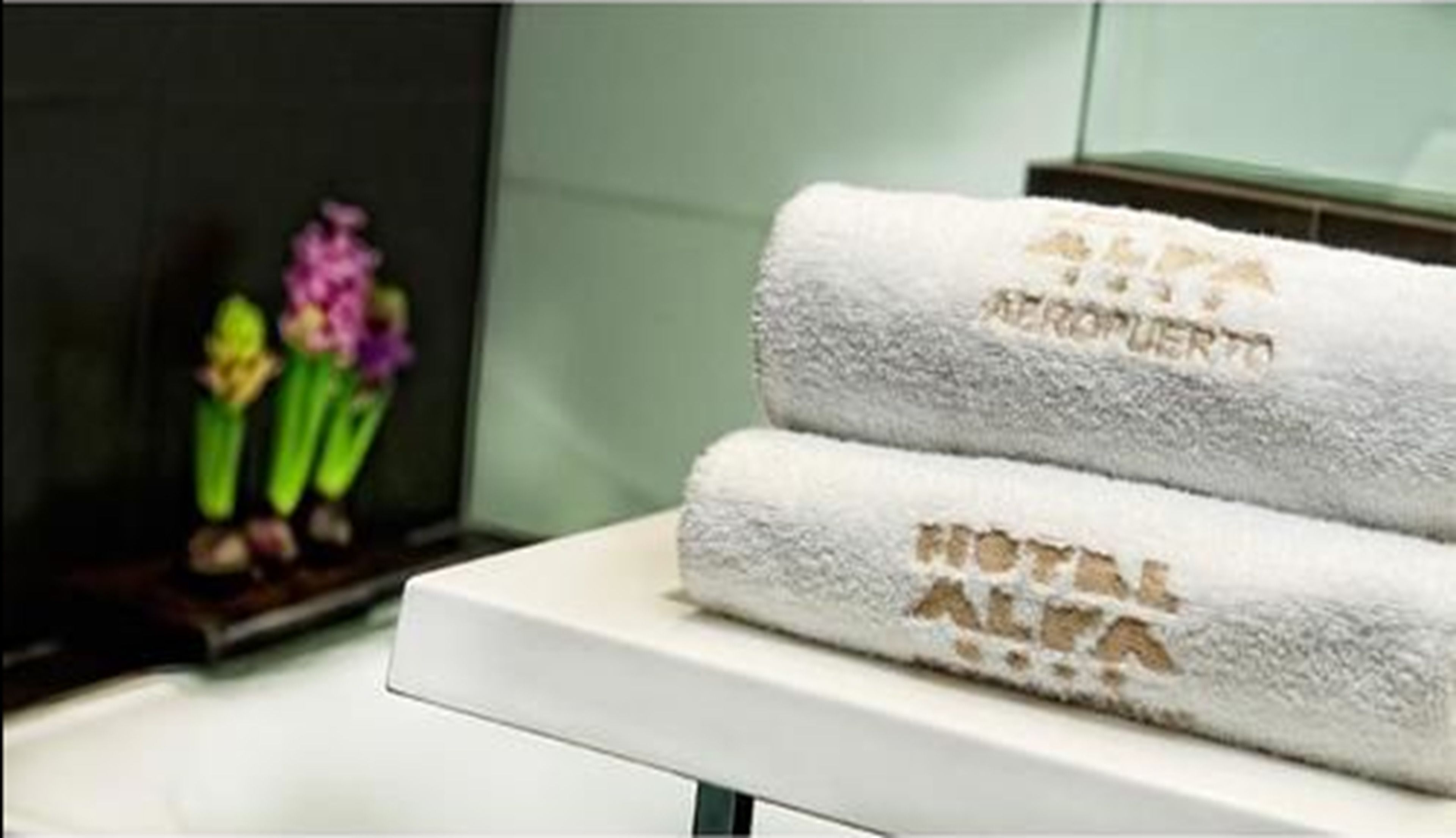 rainfall showerhead, eco-friendly toiletries, hair dryer, towels