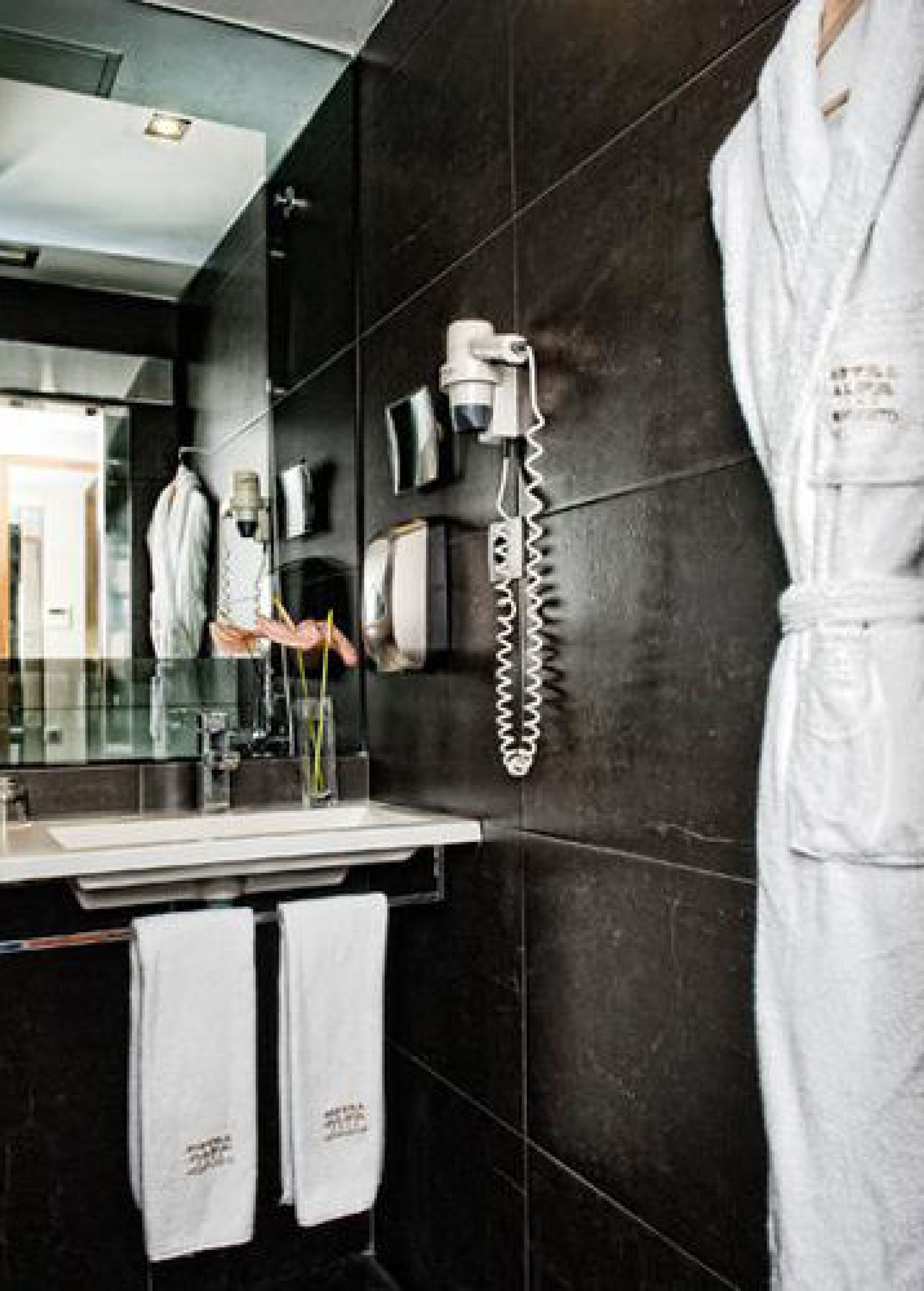 rainfall showerhead, eco-friendly toiletries, hair dryer, towels