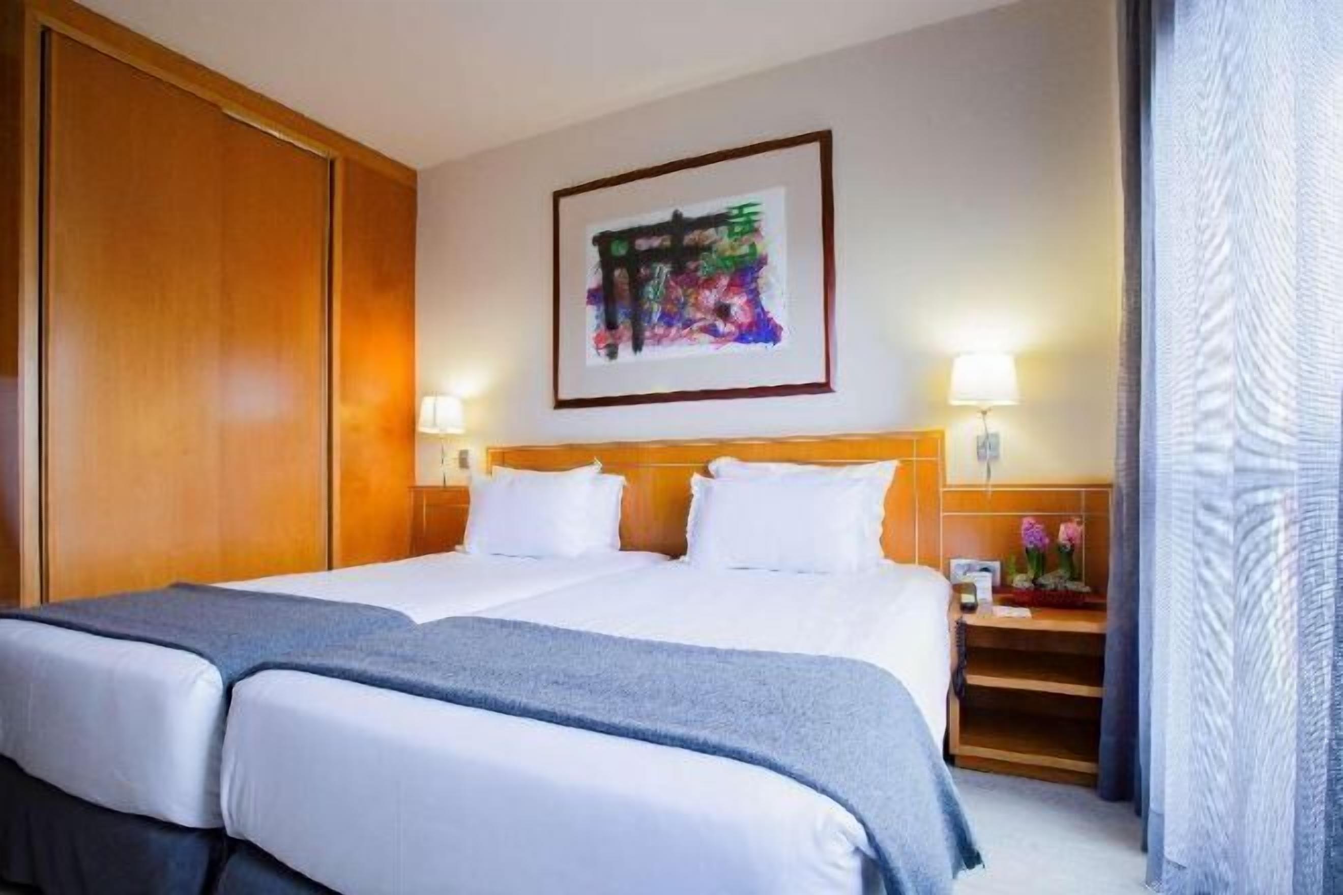 Premium bedding, pillowtop beds, minibar, in-room safe