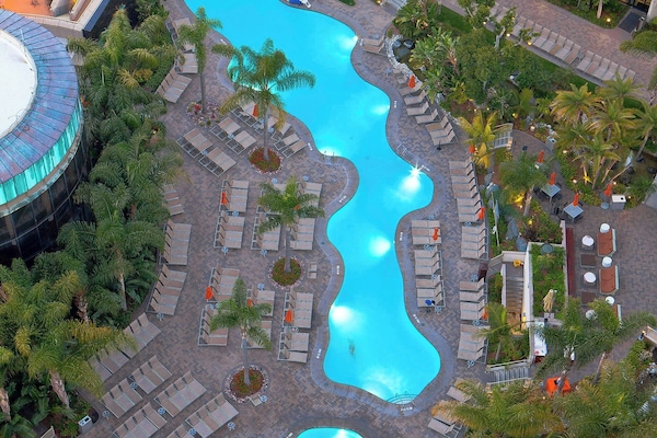 2 outdoor pools, open 6 AM to 10:00 PM, cabanas (surcharge)