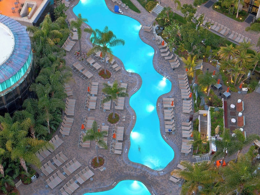 2 outdoor pools, open 6 AM to 10:00 PM, cabanas (surcharge)