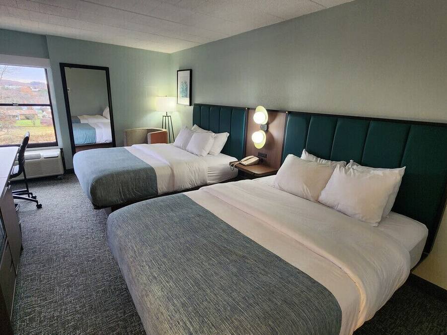 Room, 2 Queen Beds, Non Smoking | Desk, laptop workspace, blackout drapes, iron/ironing board
