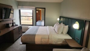 Suite junior, 1 cama de matrimonio grande, no fumadores | Escritorio, espacio para trabajar con un portátil, cortinas opacas