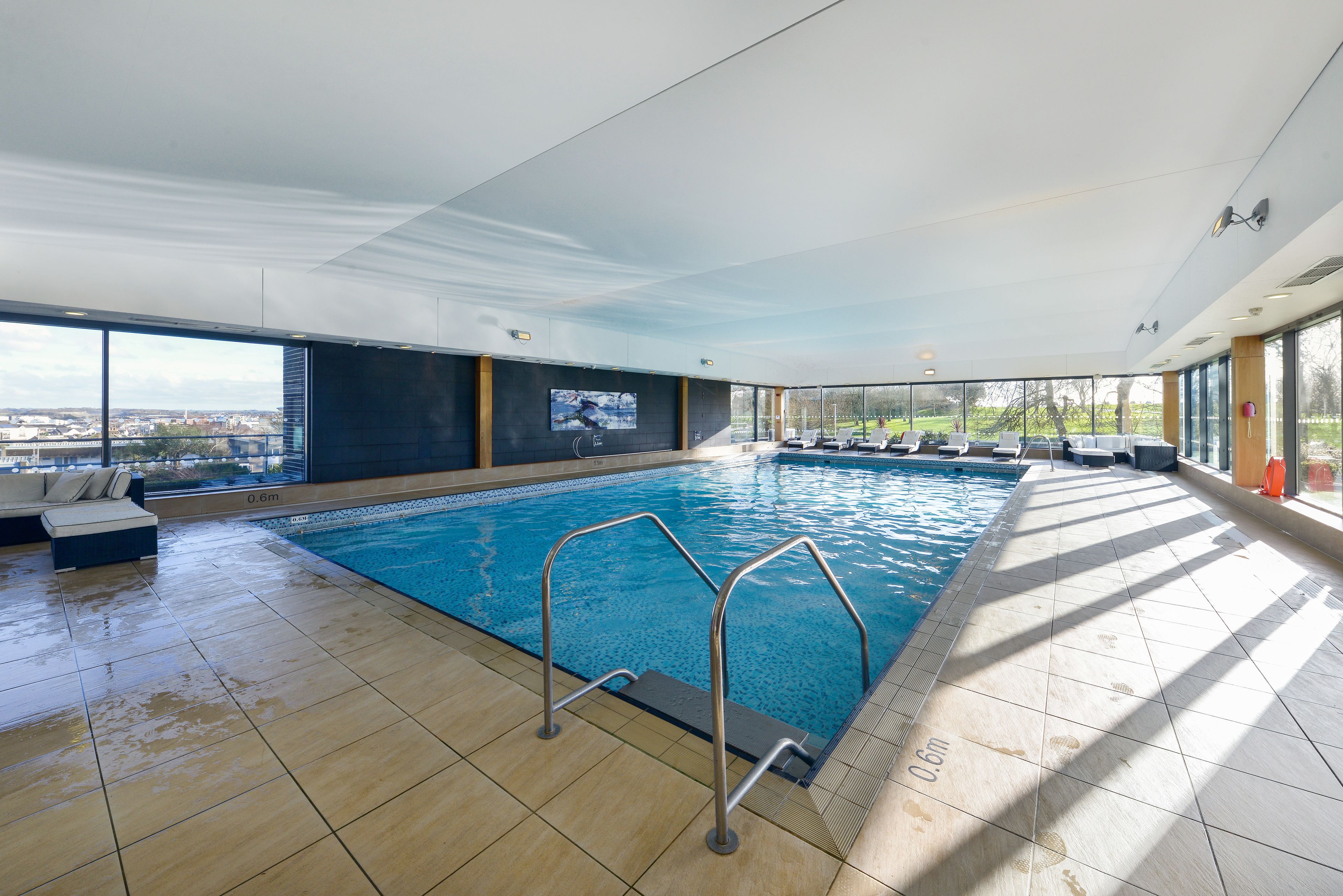 indoor pool, open 6:30 am to 10:00 pm, pool loungers