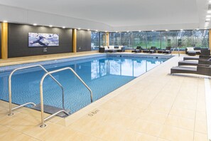 Indoor pool, open 6:30 AM to 10:00 PM, pool loungers