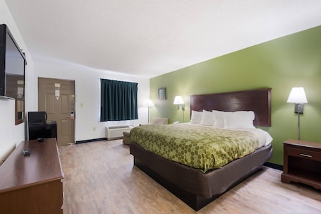 Chambre Standard, 1 trĂšs grand lit, non-fumeurs | Bureau, rideaux occultants, fer et planche Ă repasser, Wi-Fi gratuit