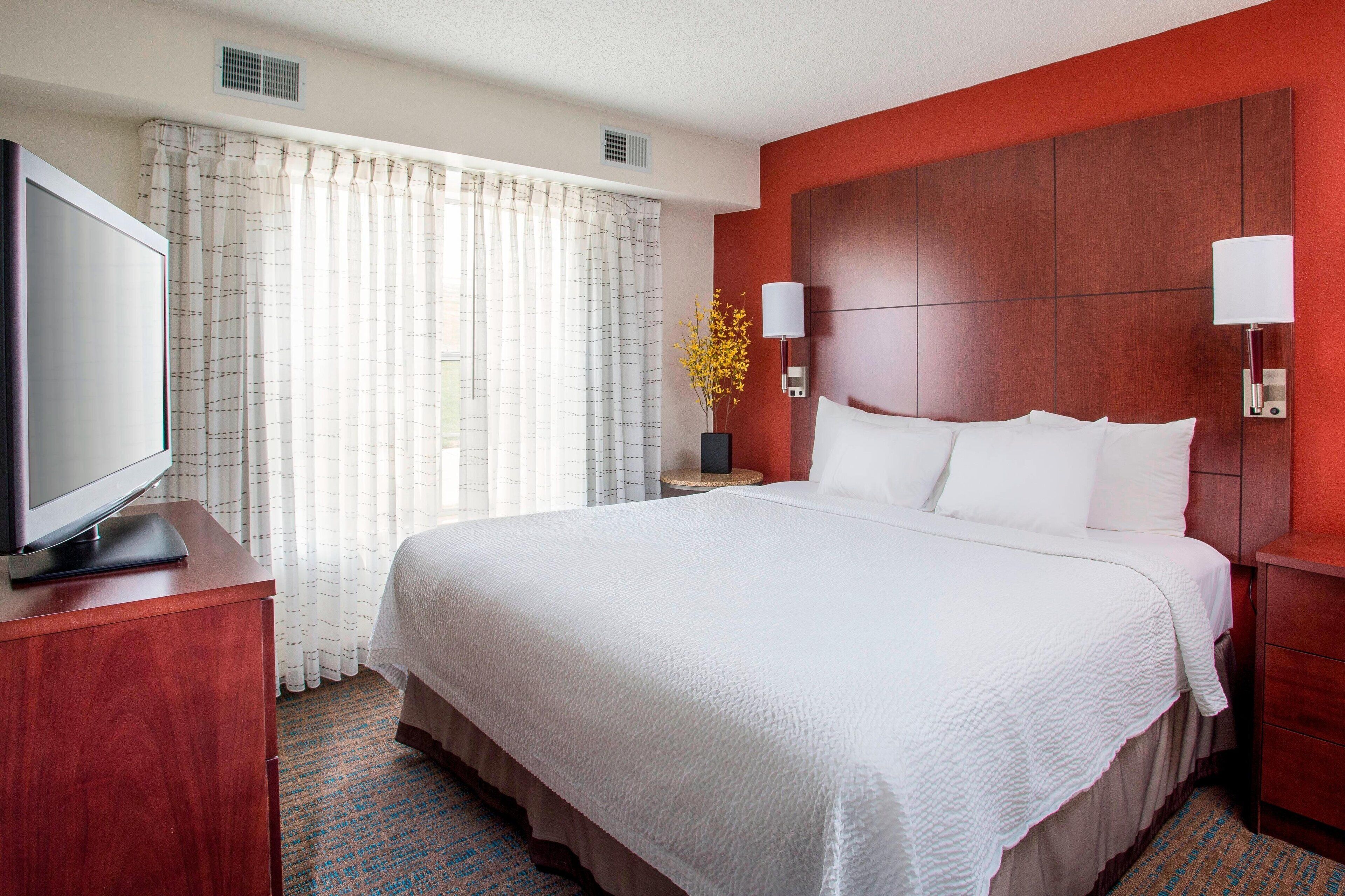 premium bedding, desk, laptop workspace, iron/ironing board