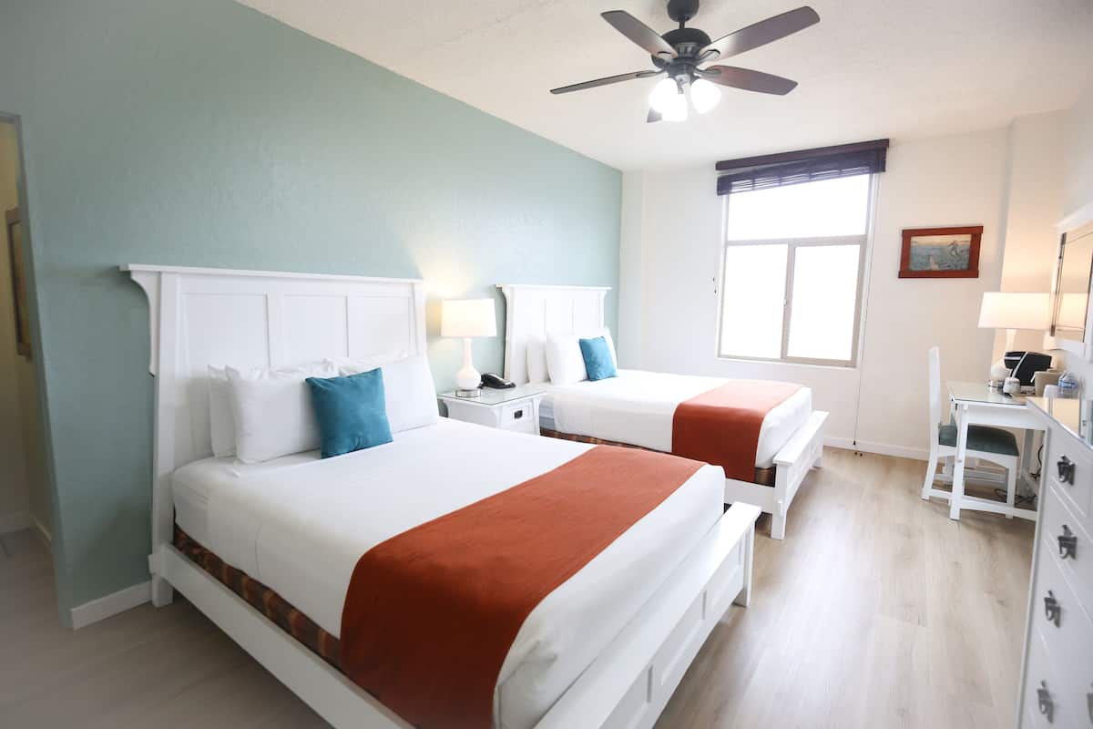 Memory-foam beds, in-room safe, desk, laptop workspace