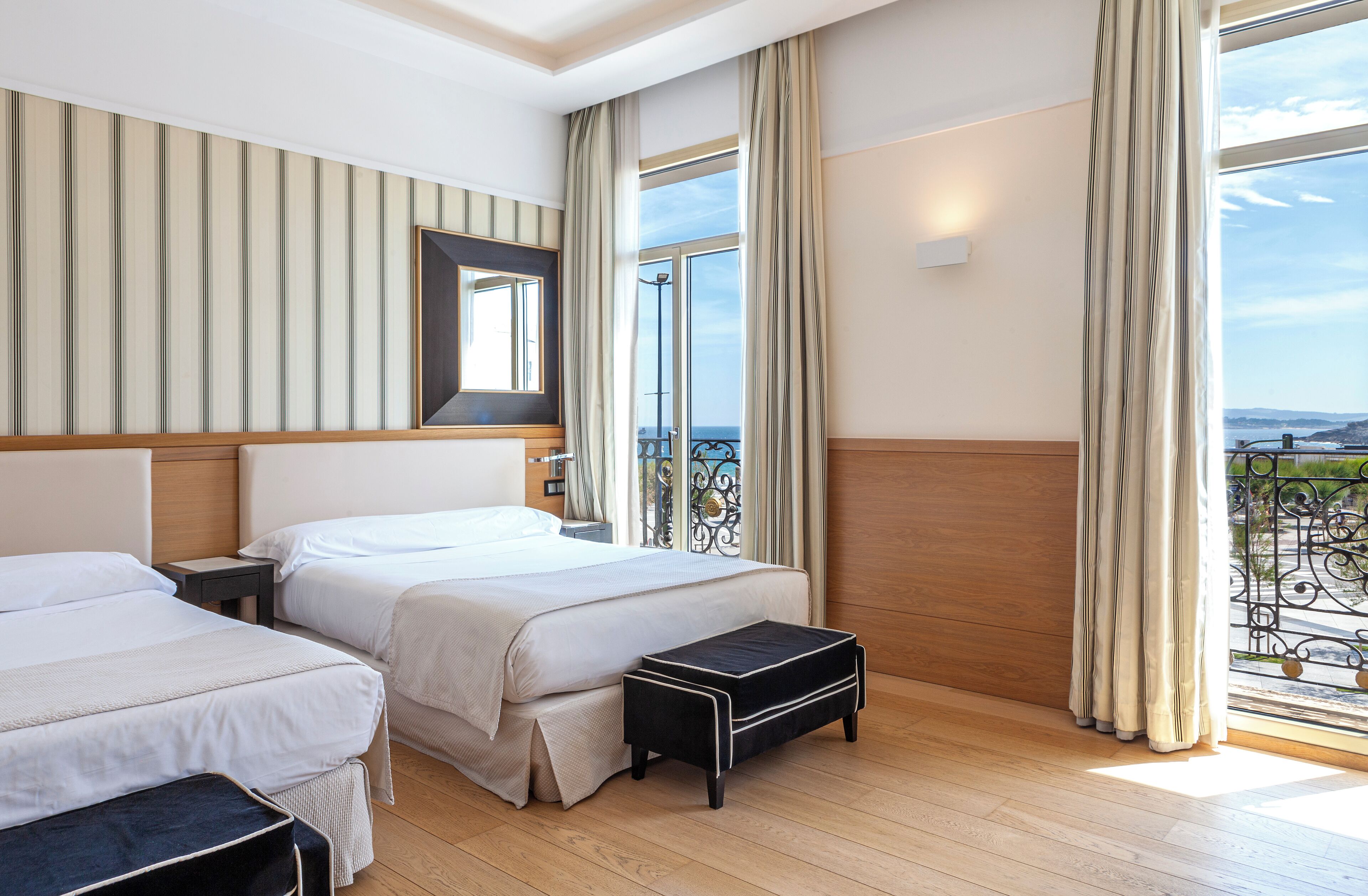 Family Room, 2 Double Beds, Beach View | Minibar, in-room safe, desk, laptop workspace