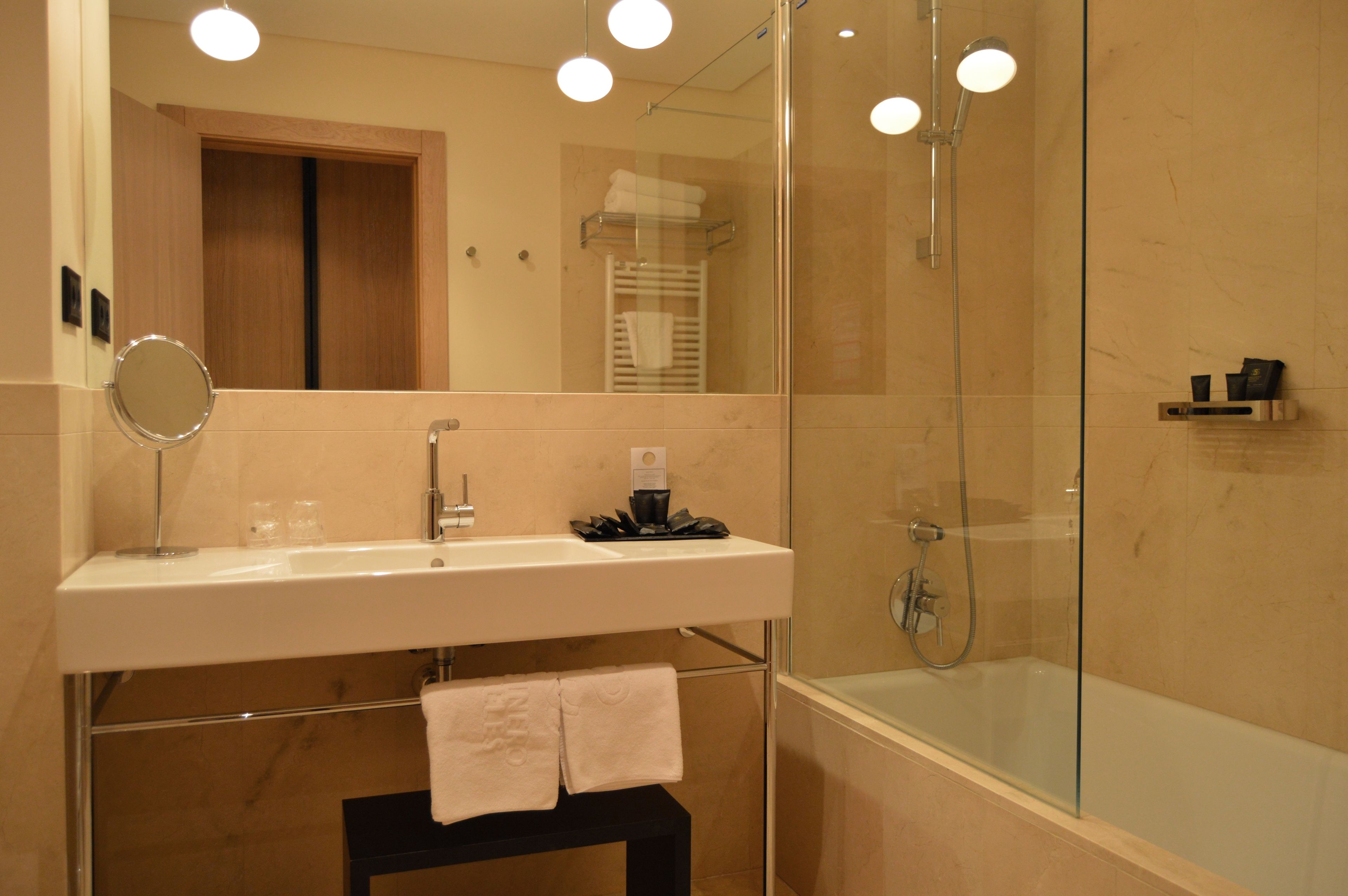 free toiletries, hair dryer, bidet, towels