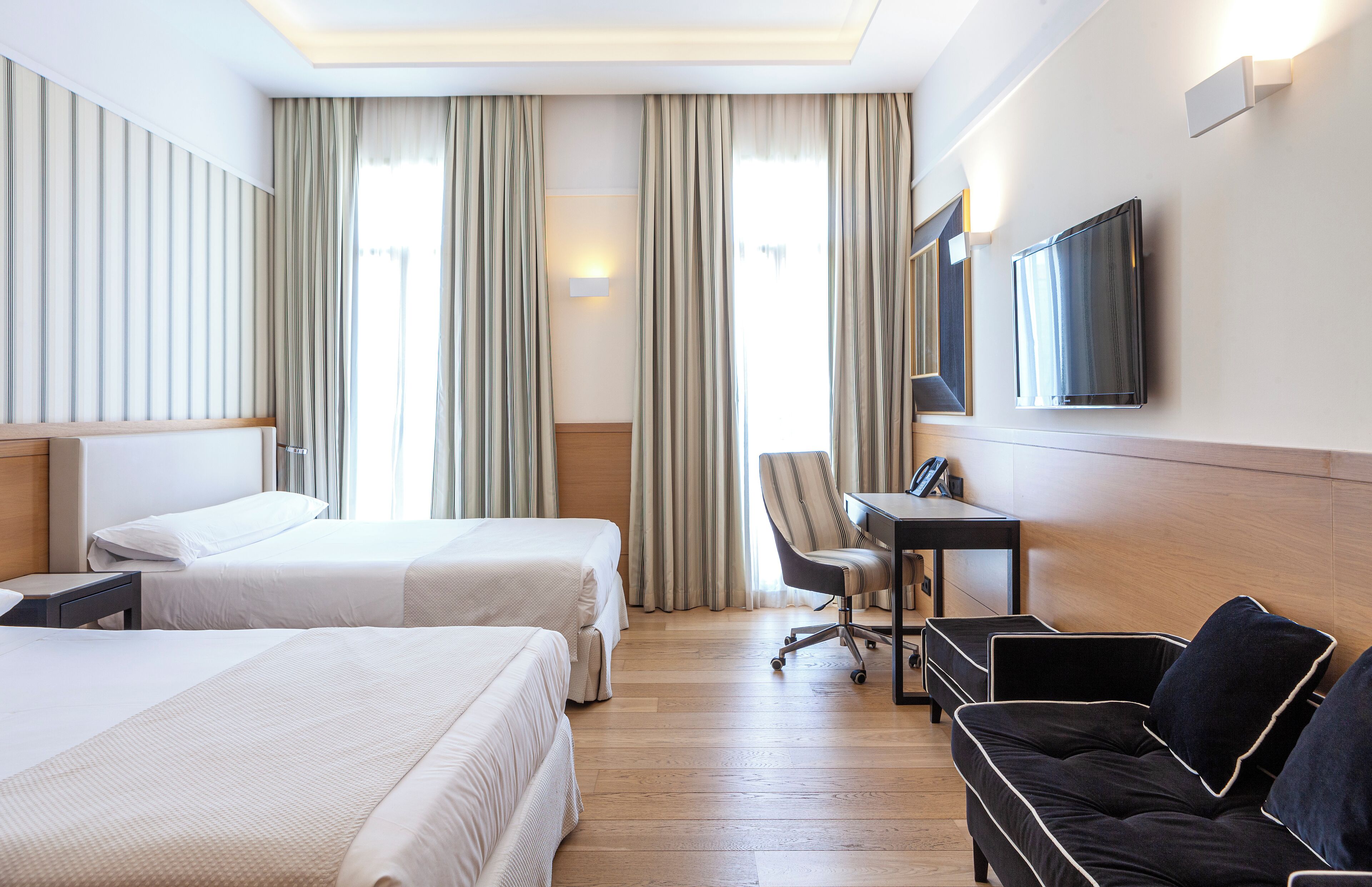 Family Room, 2 Double Beds, Bathtub | Minibar, in-room safe, desk, laptop workspace