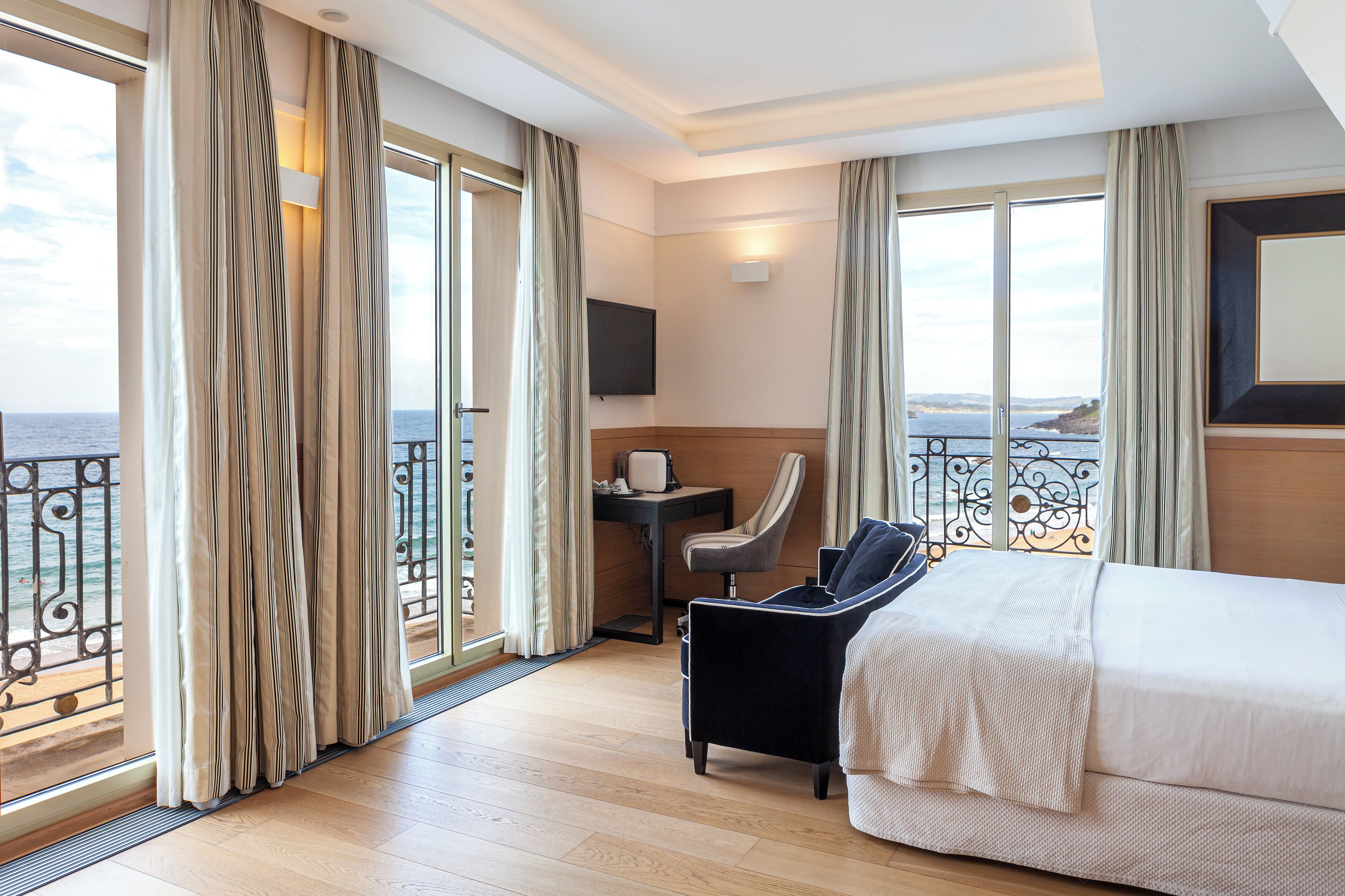 Junior Triple Room, 1 Queen Bed, Beach View | Minibar, in-room safe, desk, laptop workspace