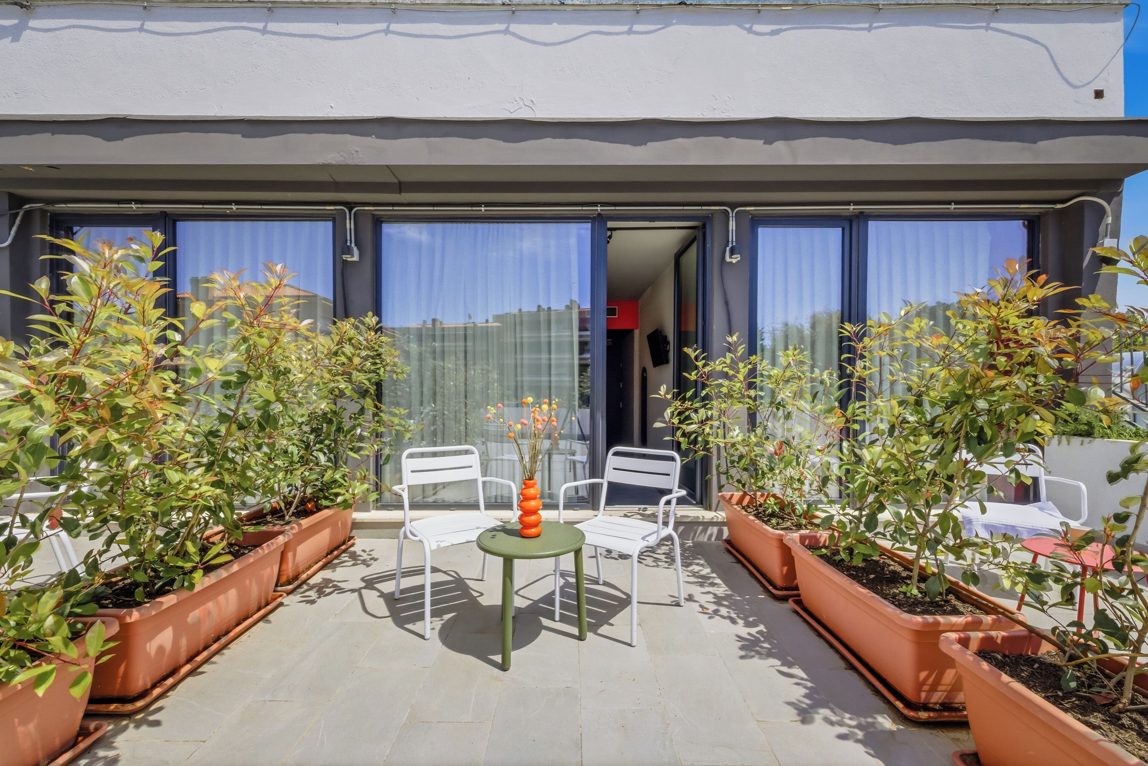 Quarto superior, 1 cama de casal, sacada | Terraço/pátio