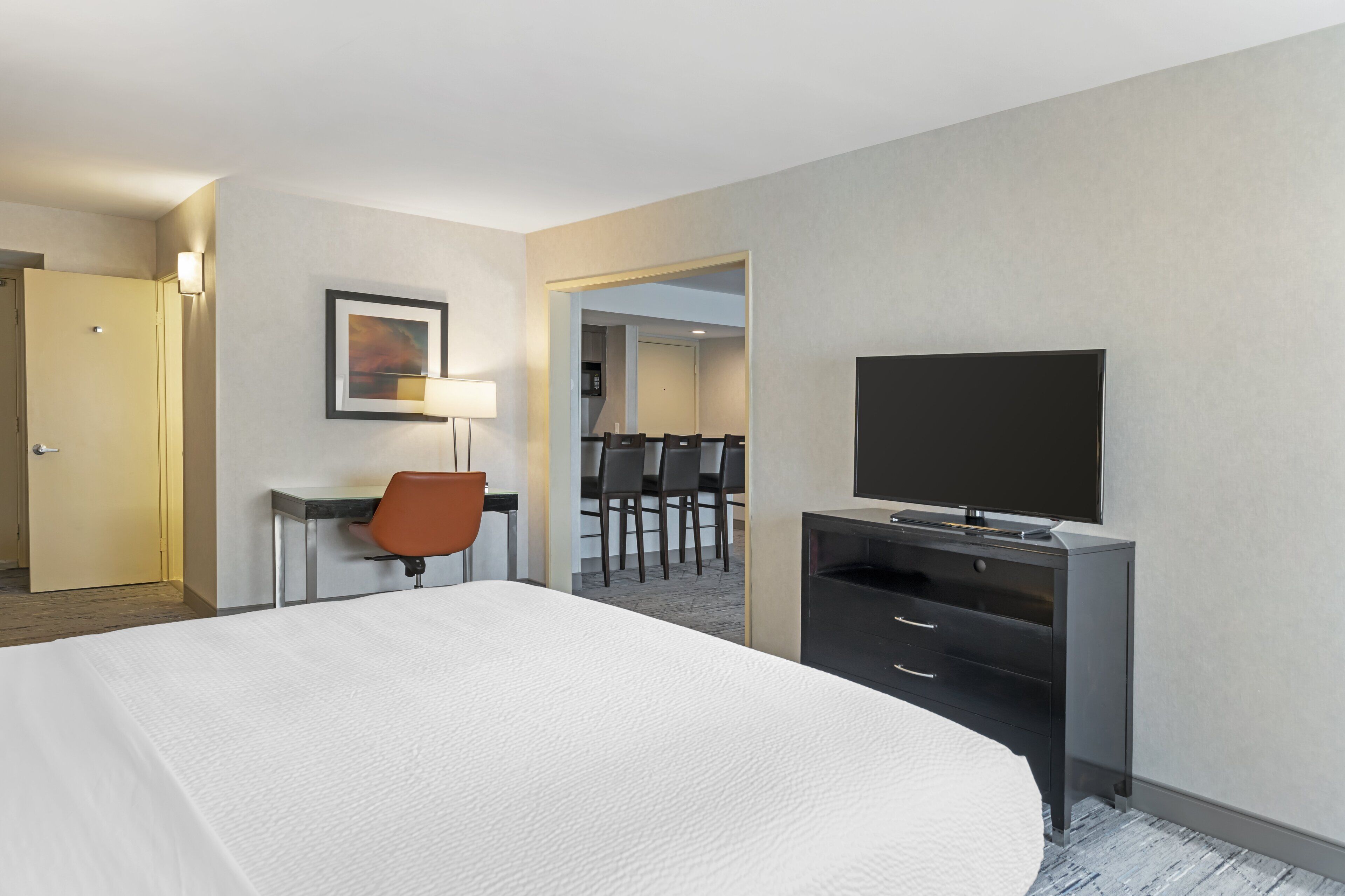 Hypo-allergenic bedding, desk, blackout drapes, iron/ironing board