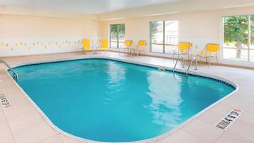 Indoor pool, open 6:00 AM to 10:00 PM, pool loungers