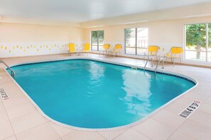 Indoor pool, open 6:00 AM to 10:00 PM, pool loungers
