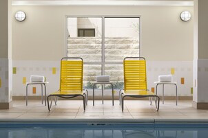 Indoor pool, open 6:00 AM to 10:00 PM, sun loungers