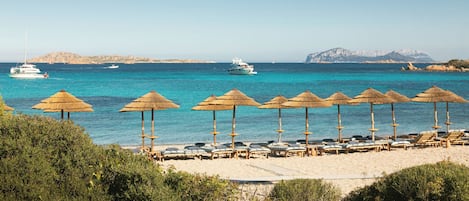 Private beach, water skiing, windsurfing, beach bar