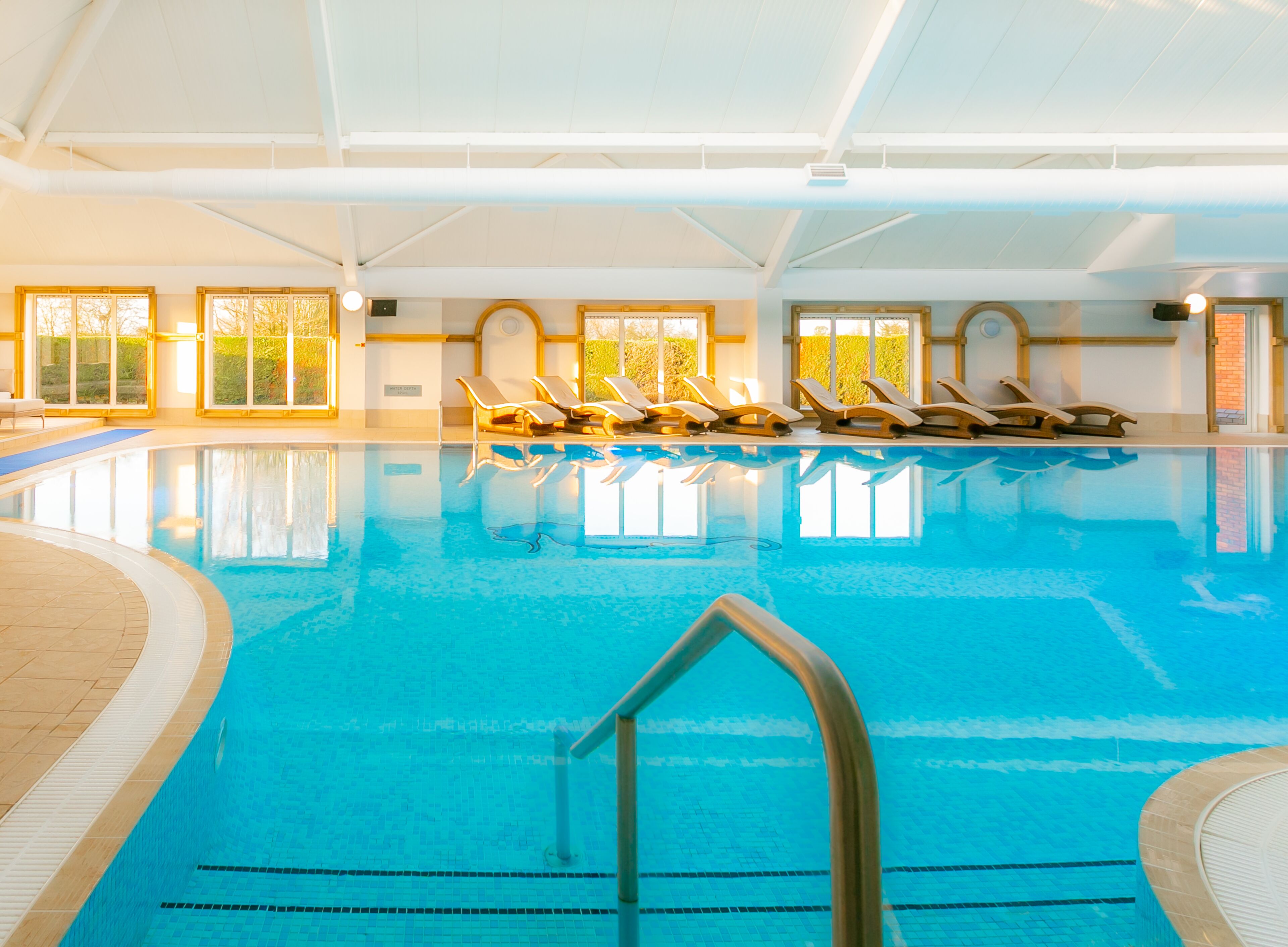indoor pool, pool loungers