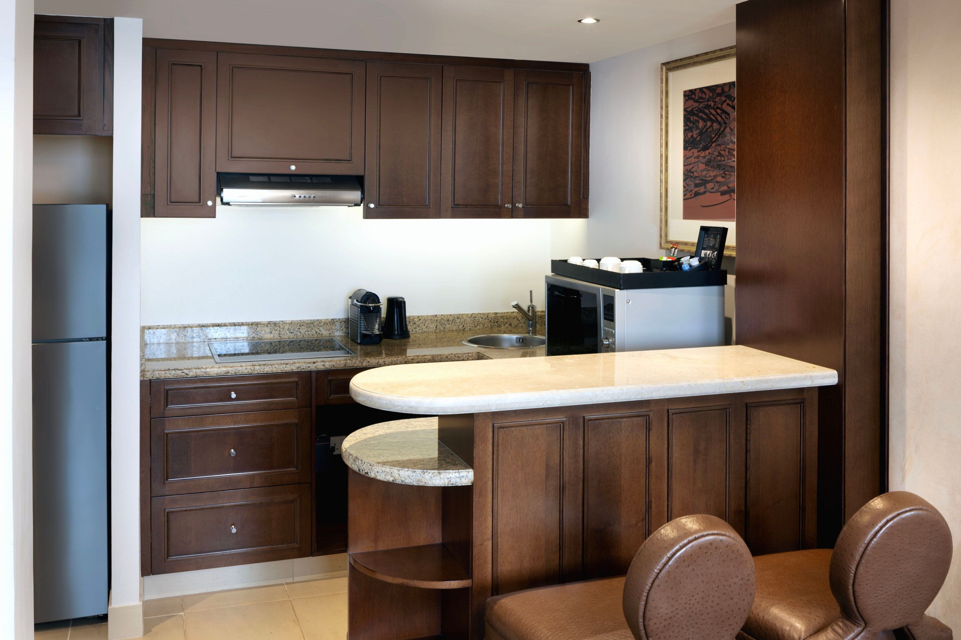 suite, 1 king bed | private kitchen | mini-fridge, coffee/tea maker, electric kettle, high chair