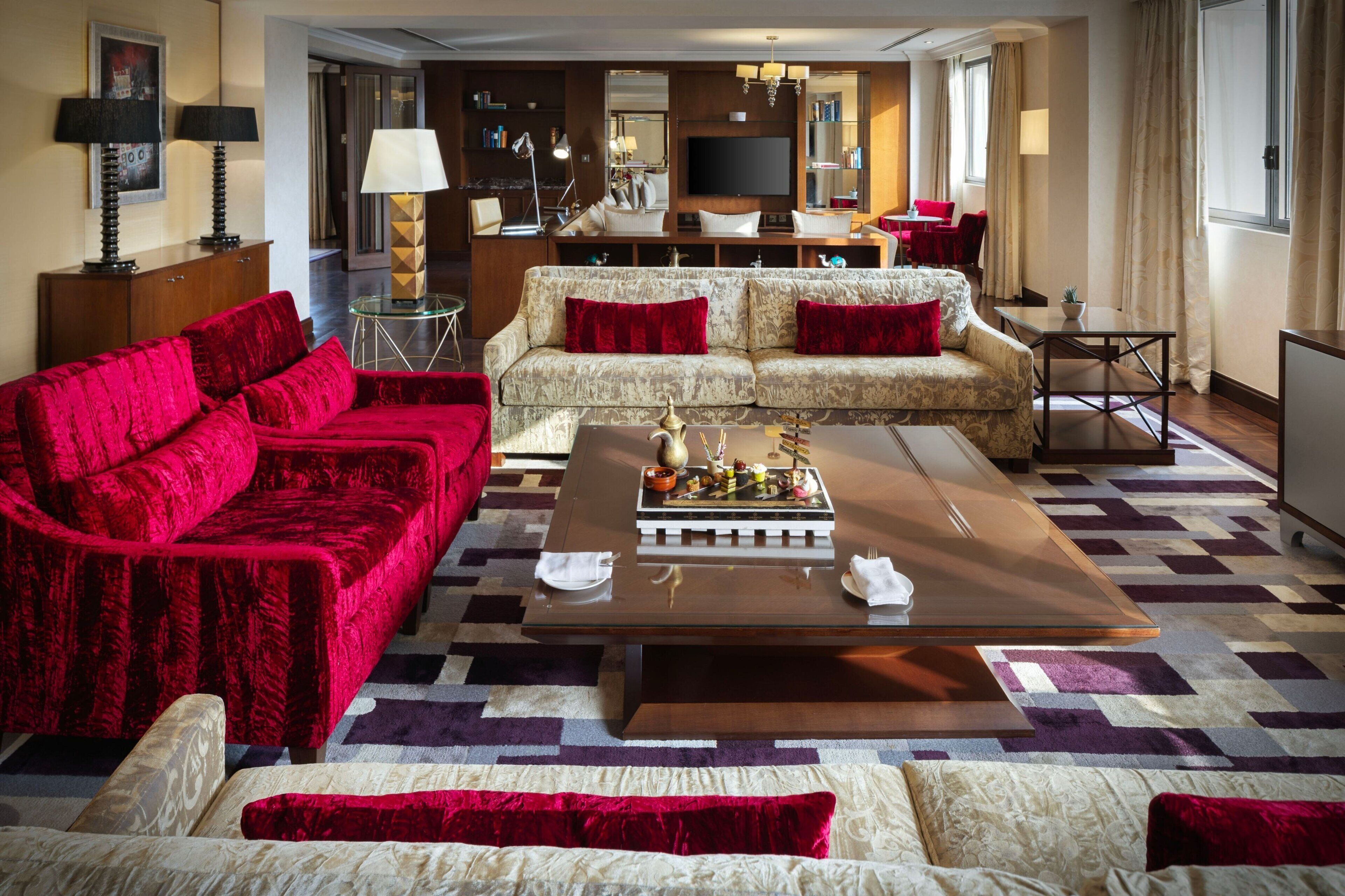 royal suite, 1 king bed, non smoking | living room | 43-inch led tv with satellite channels, tv, ipod dock