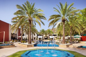 Indoor pool, outdoor pool, open 6:00 AM to 9:00 PM, pool umbrellas