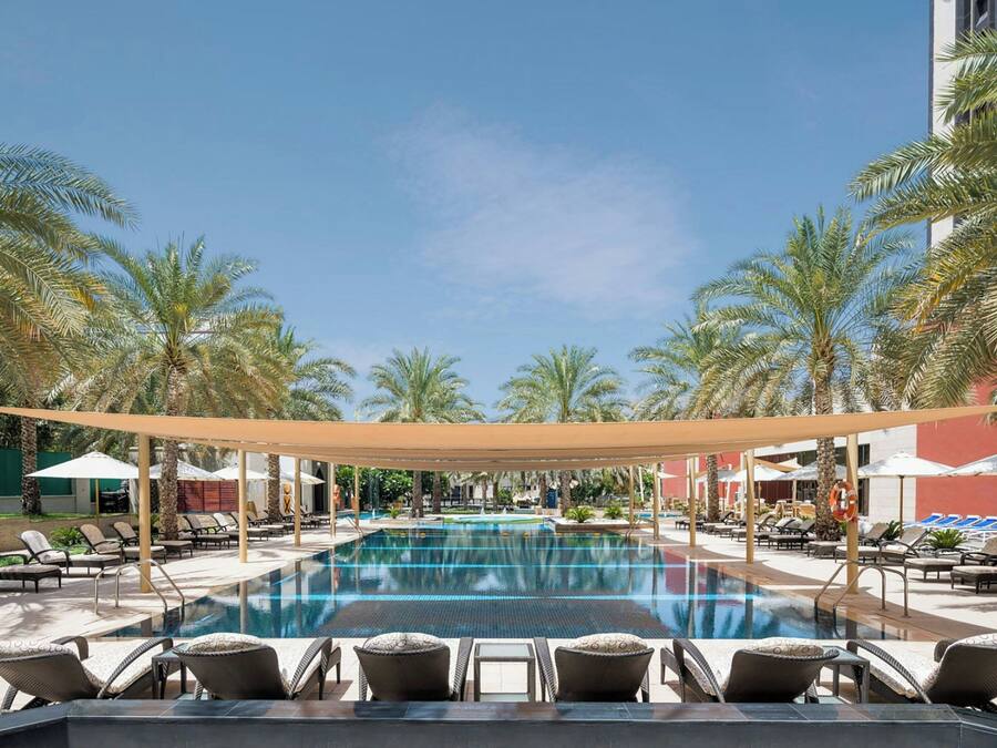Indoor pool, outdoor pool, open 6:00 AM to 9:00 PM, pool umbrellas