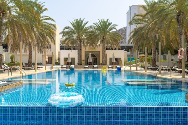 Indoor pool, 2 outdoor pools, open 6:00 AM to 9:00 PM, pool umbrellas