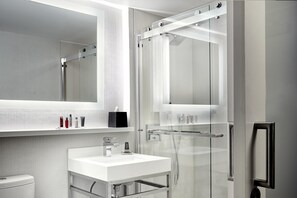 Designer toiletries, hair dryer, towels, soap