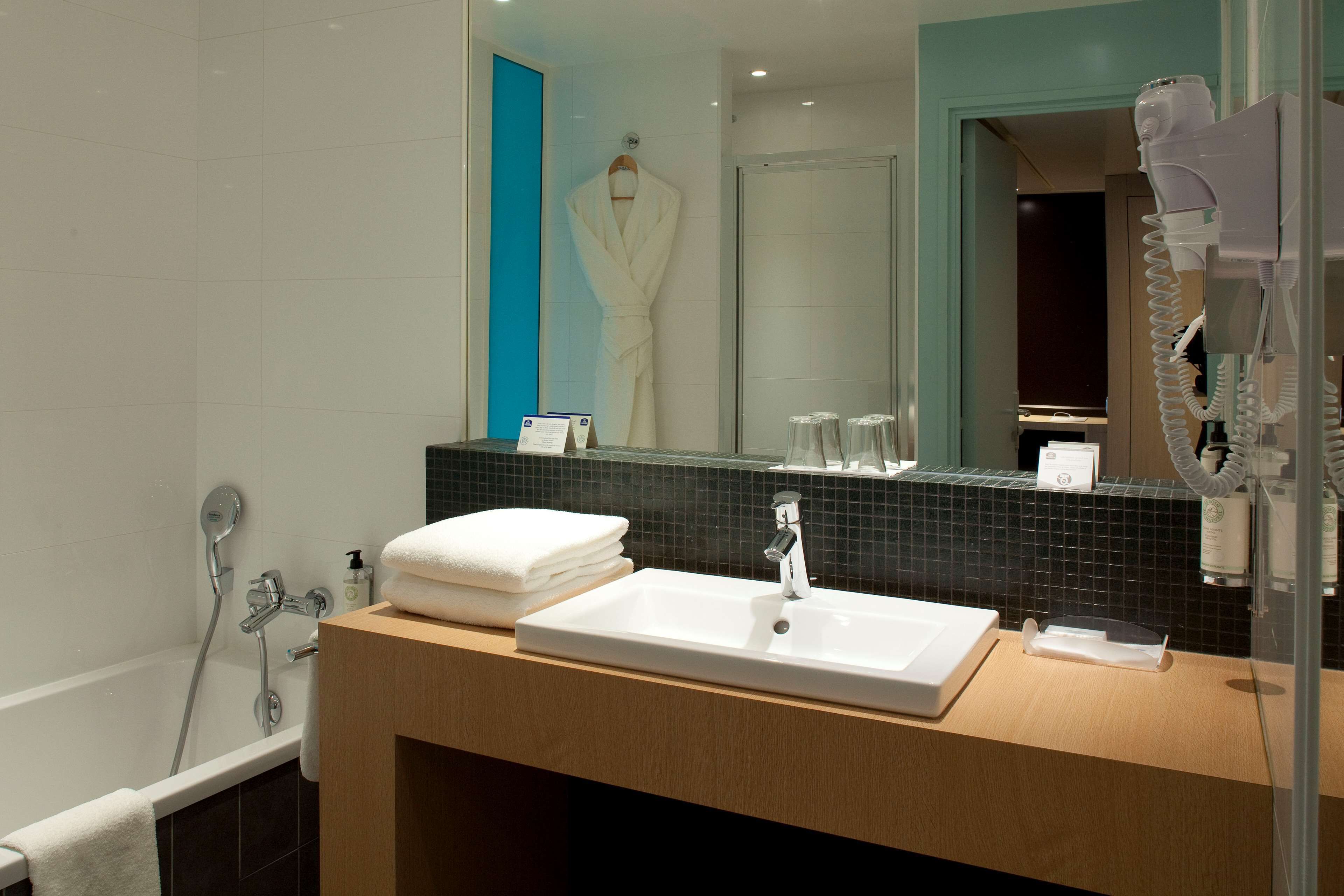 free toiletries, hair dryer, slippers, towels