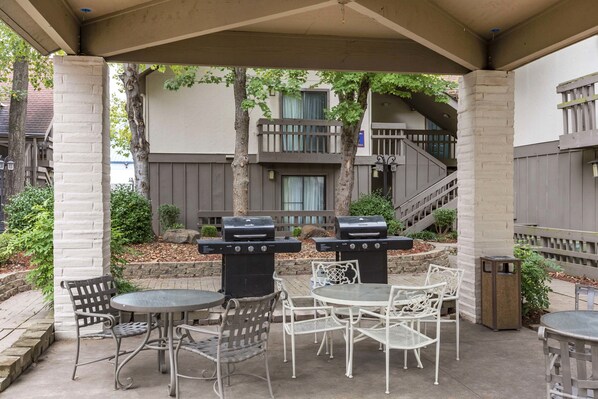 Enjoy al fresco dining and socializing in this sheltered patio area, complete with barbecue grills and comfortable seating.