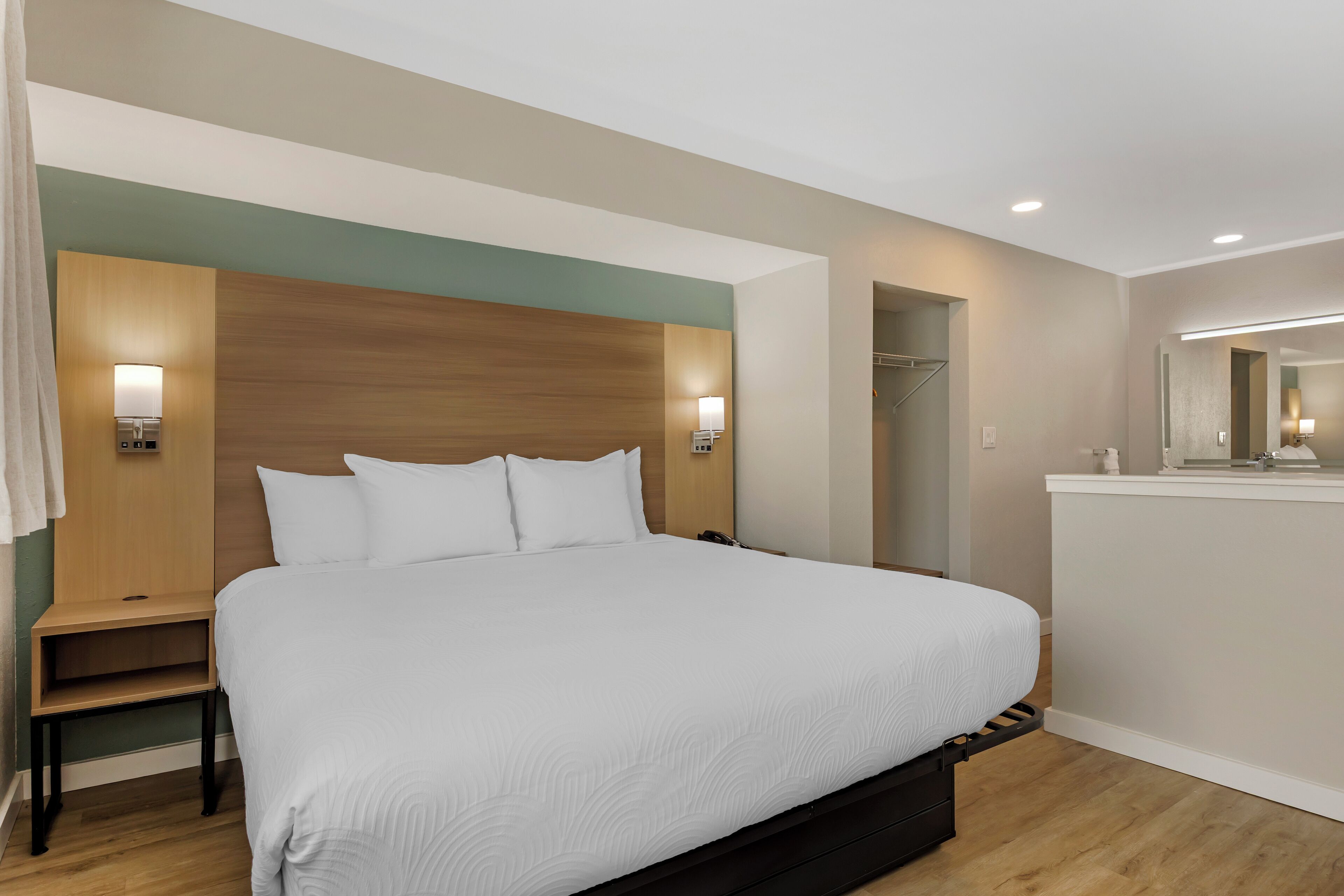 Premium bedding, blackout drapes, iron/ironing board, free WiFi