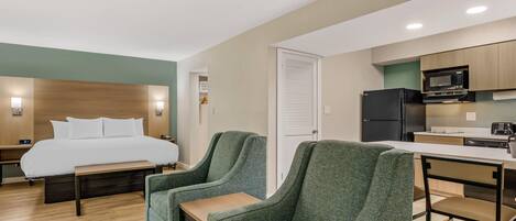 Suite, 1 King Bed, Non Smoking | Premium bedding, blackout drapes, iron/ironing board, free WiFi
