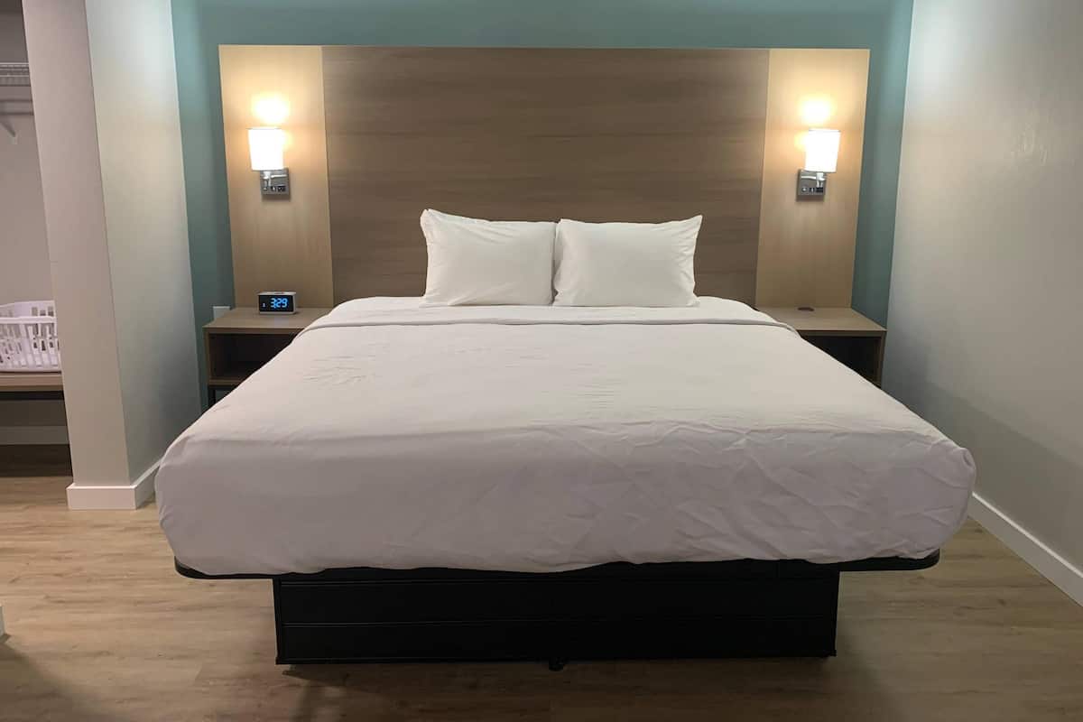 Premium bedding, blackout curtains, iron/ironing board, free WiFi