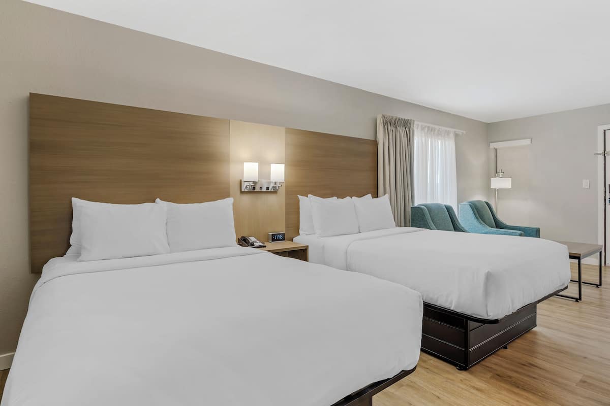 Suite, 2 Double Beds, Non Smoking | Premium bedding, blackout drapes, iron/ironing board, free WiFi