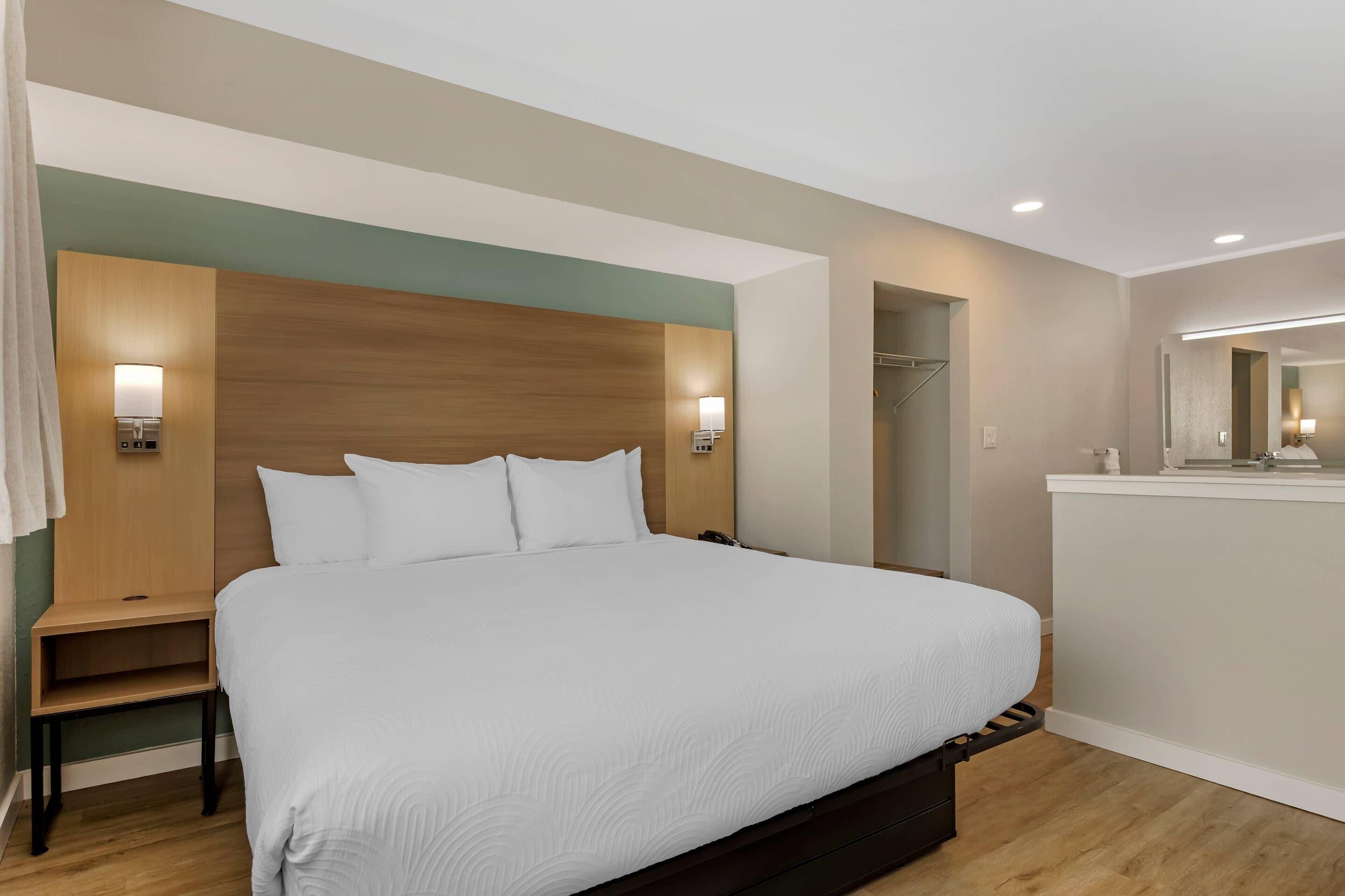 Suite, Multiple Beds, Non Smoking | Premium bedding, blackout drapes, iron/ironing board, free WiFi