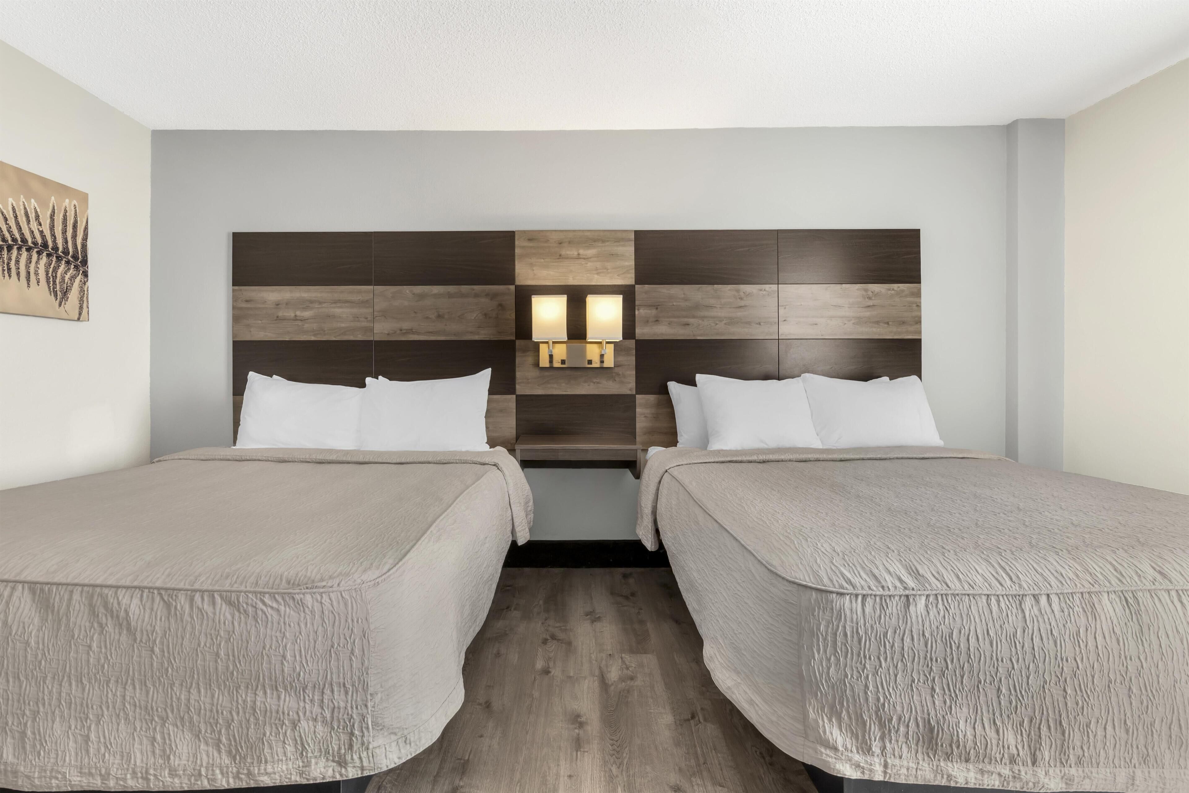 Standard Room, 2 Queen Beds, Non Smoking (Walk-in Shower;Pet Friendly) | Desk, laptop workspace, blackout drapes, iron/ironing board