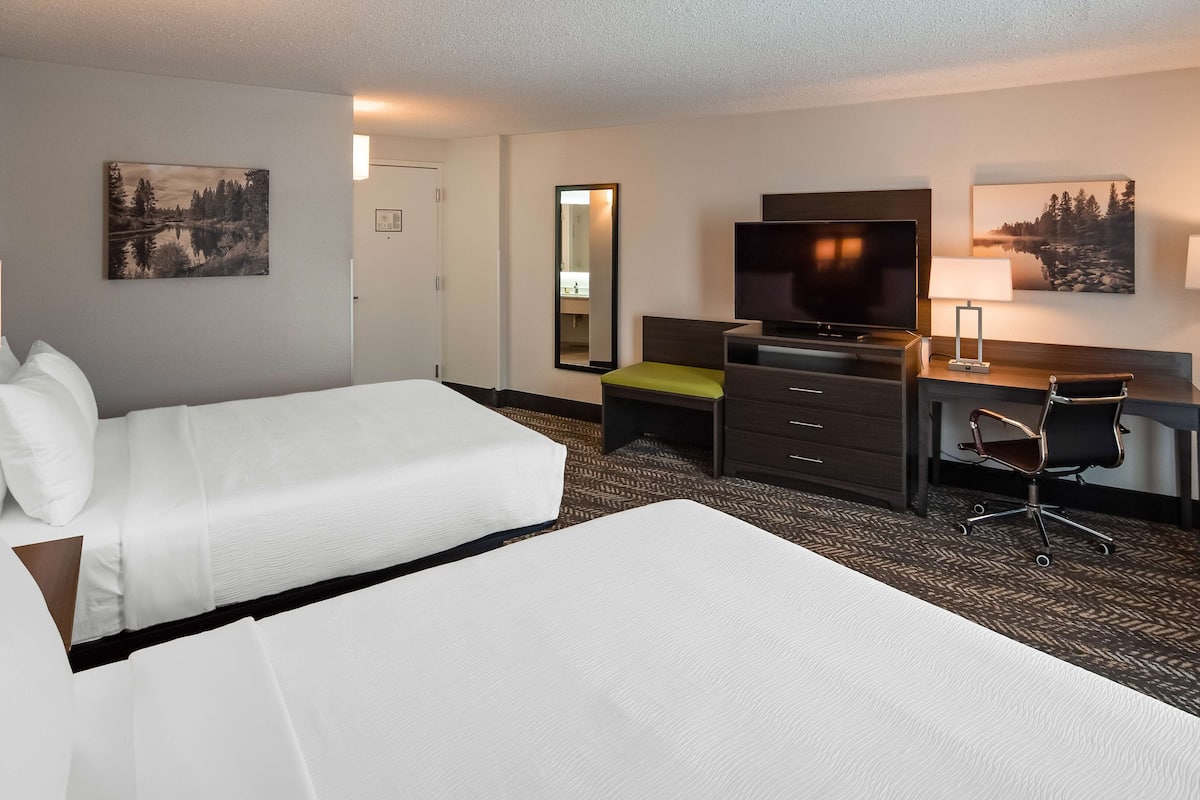 desk, laptop workspace, blackout curtains, iron/ironing board