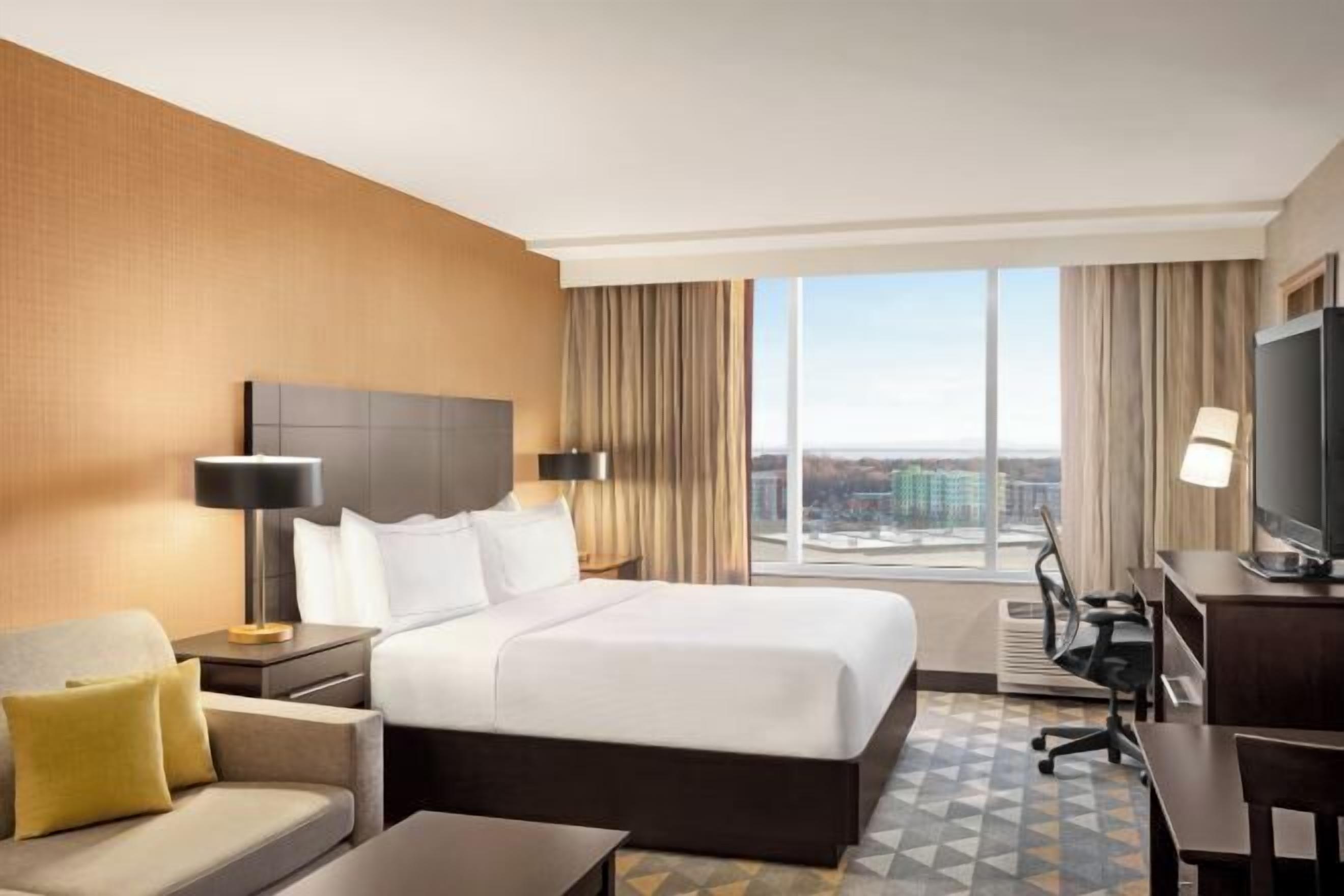 Premium bedding, down duvets, pillow-top beds, in-room safe